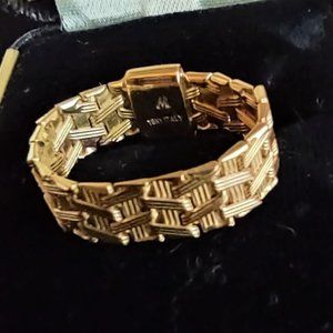 Wonderful Basket weave 18k Estate find! It's a size 7 1/2.